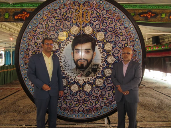 برپایی نماز جماعت ظهر وعصر در مقبره شهید والامقام حججی